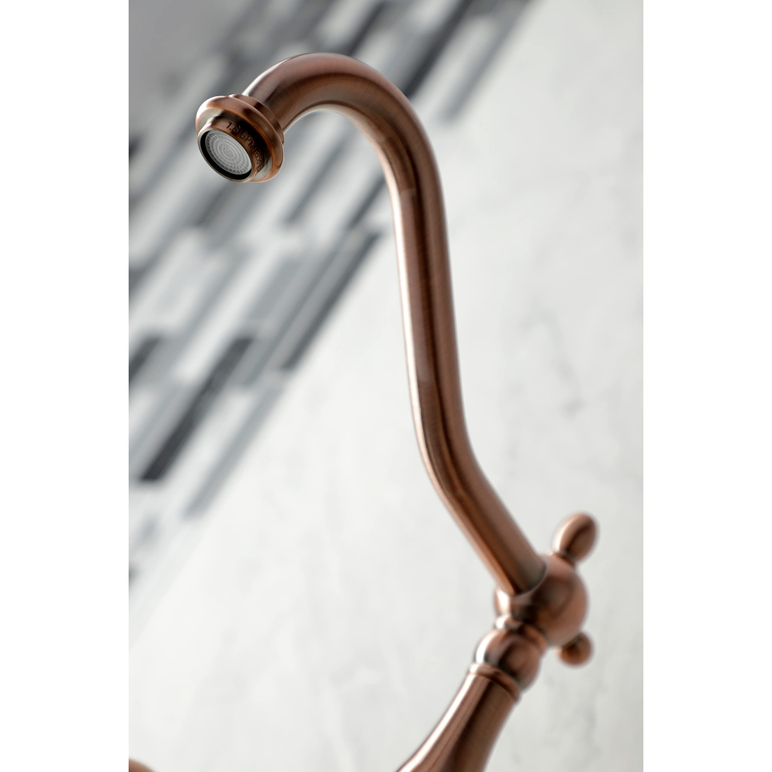 Kingston Brass KS124AXBSAC Heritage Wall Mount Bridge Kitchen Faucet with Brass Spray, Antique Copper
