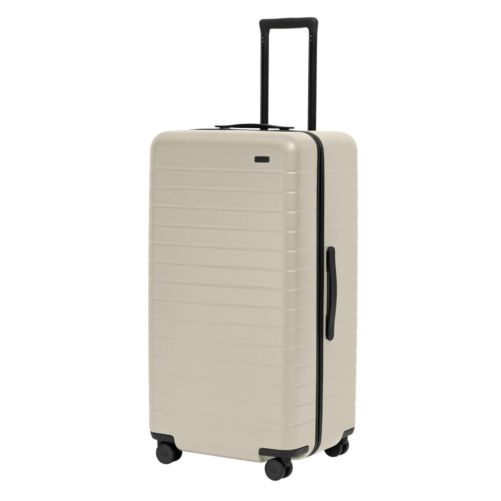 Away Trunk Checked Luggage - 31-Inch Lightweight Hardside Suitcase with 360° WhisperGlide Spinner Wheels, Interior Compression System, TSA-Accepted Lock - Salt White