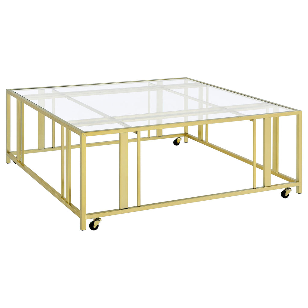 Coaster Home Furnishings - Adri - Square Glass Top Coffee Table with Geometric Base and Mobile with Rolling Casters - Contemporary - Living Room - Matte Brass - 710188