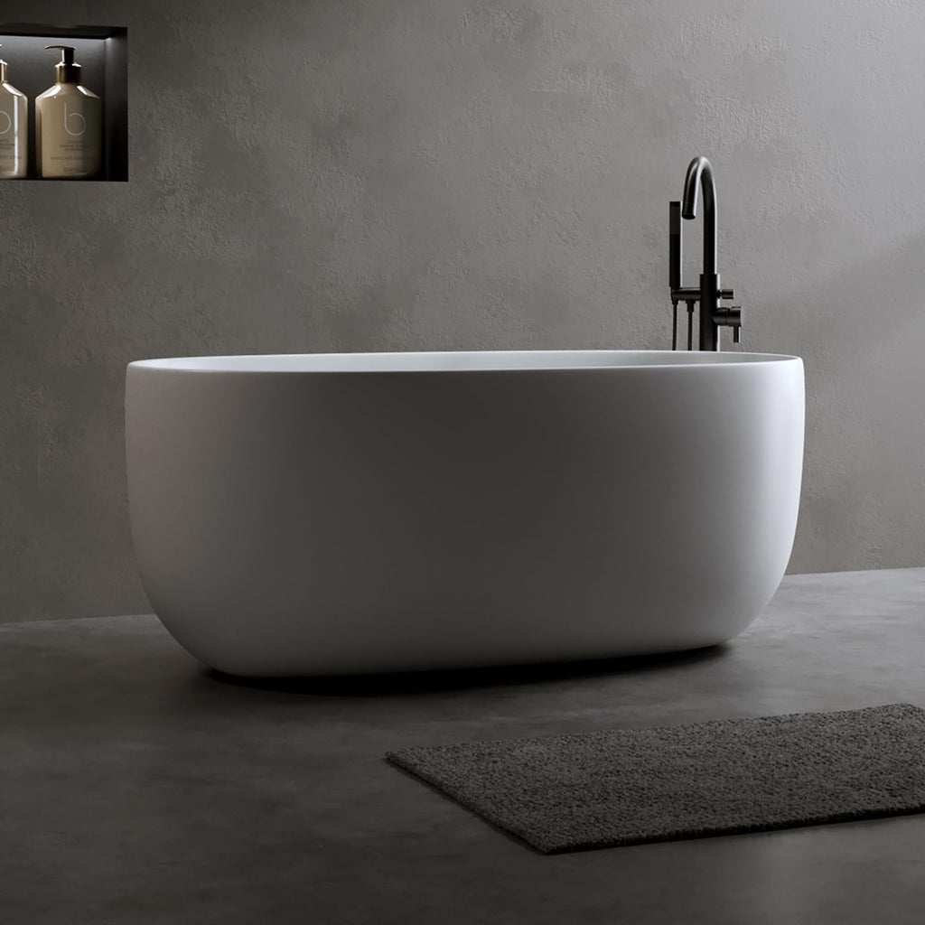 Favfurish 47" Freestanding Stone Resin Bathtub,Oval Shape Contemporary Soaking Tub w/Pop-Up Drain & Overflow, Compact Design for Small Spaces, Matte White