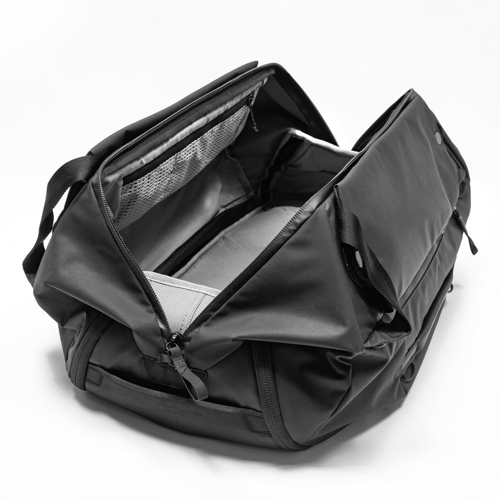 Peak Design Travel Duffelpack 45-65L, Black, Weatherproof Duffel Backpack, Expandable Design, Extra-Long Zip Path, Stowable Straps, Fits Packing Cubes and Camera Cubes, Versatile Duffel Bag for Travel