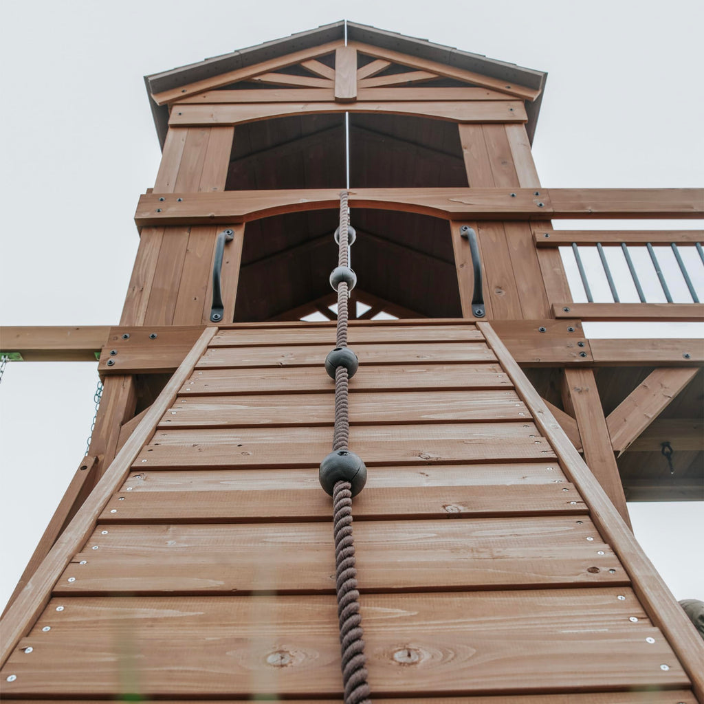 Backyard Discovery Sterling Point Cedar Wood Swing Set with Wave Slide, Raised Clubhouse, Wooden Bridge, Rock Wall, Belt Swings, Web Swing, Trapeze, Balcony, Climbing Wall, Ladder, Outdoor Playset