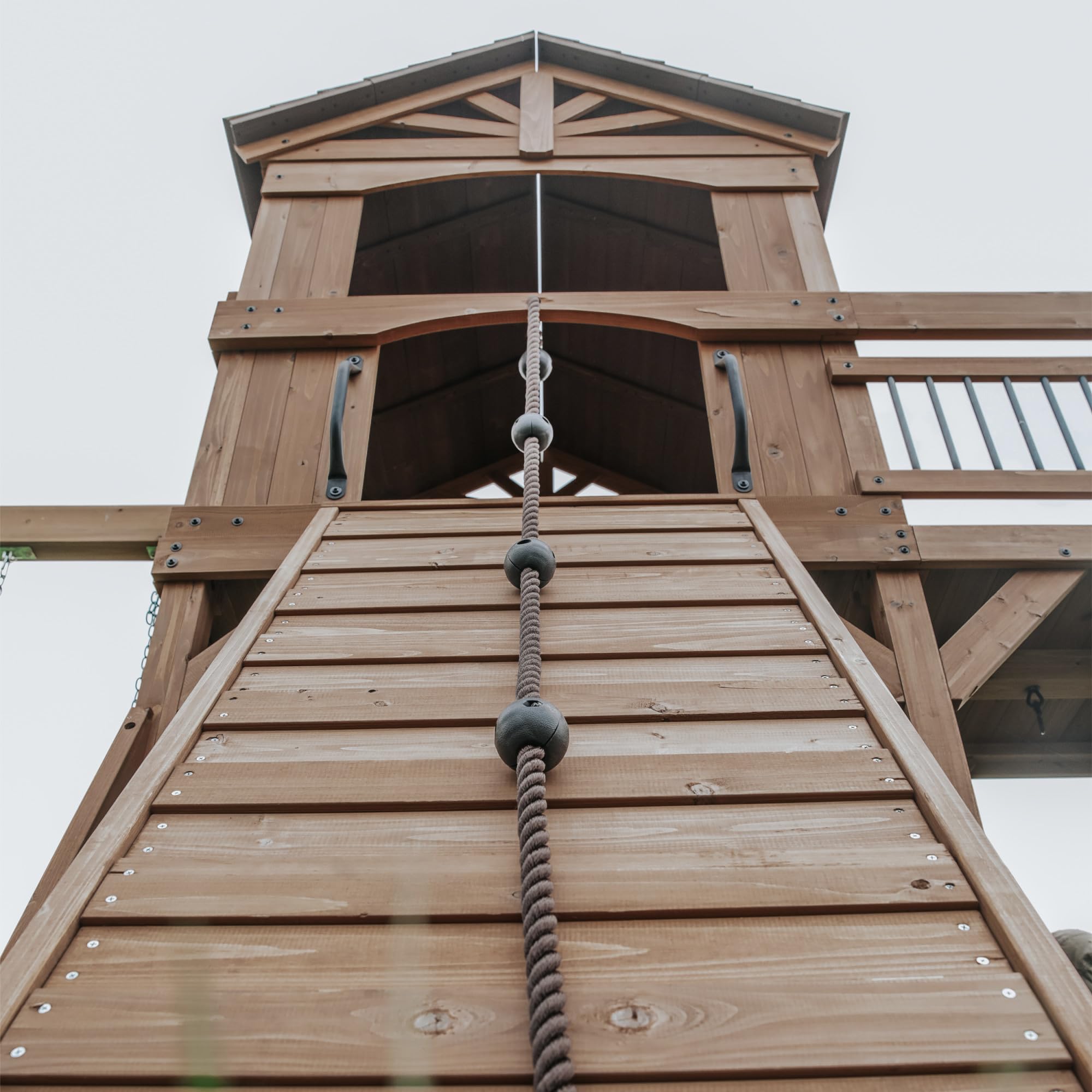 Backyard Discovery Sterling Point Cedar Wood Swing Set with Wave Slide, Raised Clubhouse, Wooden Bridge, Rock Wall, Belt Swings, Web Swing, Trapeze, Balcony, Climbing Wall, Ladder, Outdoor Playset