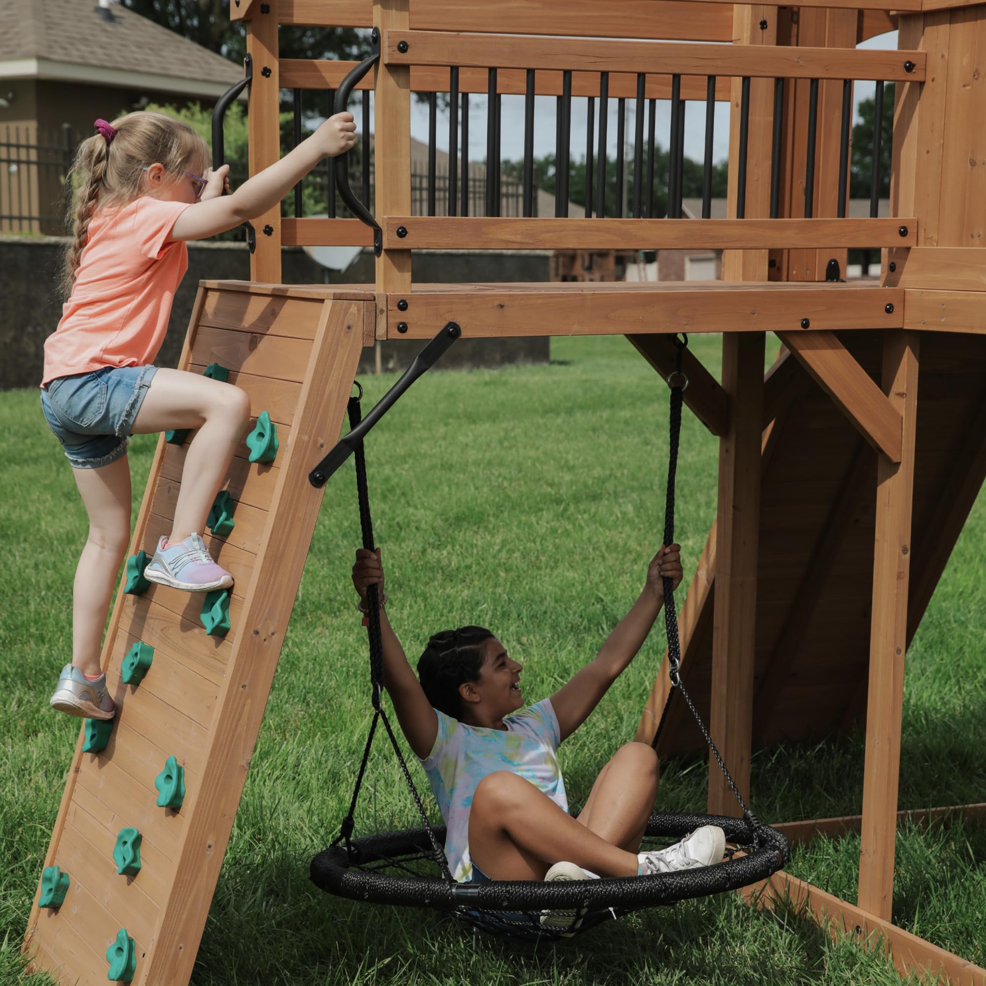 Backyard Discovery Sterling Point Cedar Wood Swing Set with Wave Slide, Raised Clubhouse, Wooden Bridge, Rock Wall, Belt Swings, Web Swing, Trapeze, Balcony, Climbing Wall, Ladder, Outdoor Playset