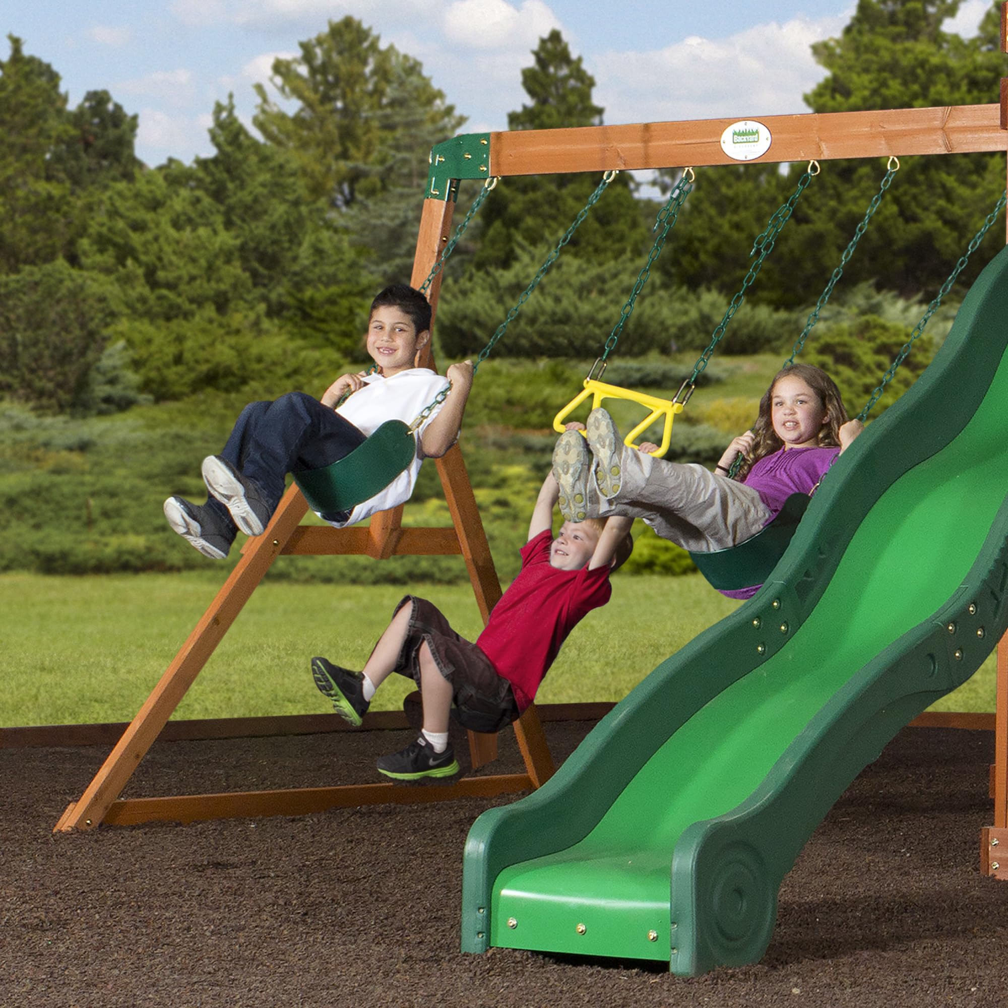 Backyard Discovery Shenandoah Cedar Wood Swing Set with Wave Slide, Raised Clubhouse, Playhouse, Play Kitchen, Belt Swings, Trapeze, Rock Wall, Ladder, Picnic Table, Full Door, Outdoor Playset