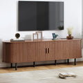 70.8" TV Stand with Power Outlet, Mid-Century Modern Television Stand, Fluted Media Console with Sliding Doors, Entertainment Center for TVs up to 60 Inch, Adjustable Shelves, Walnut