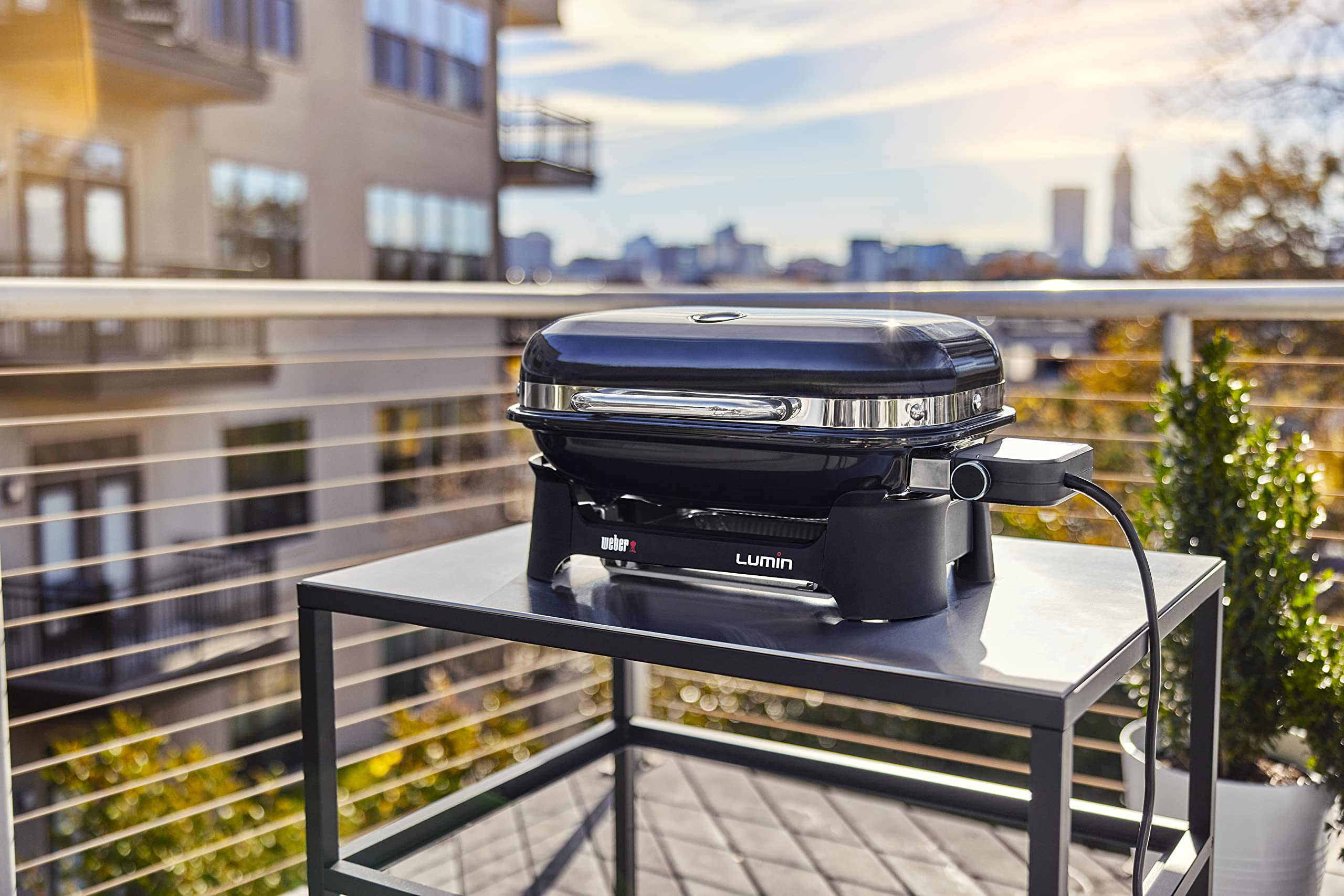 Weber Lumin Portable Electric Grill, Black – High‑Heat Outdoor BBQ Reaching 600°F for Searing, Smoking, Steaming & Warming – Ideal for Samll Spaces & Travel