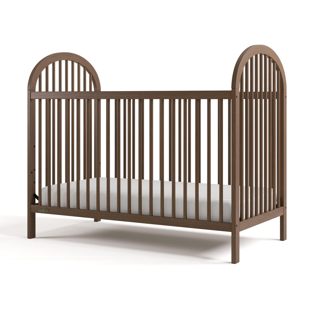 Graco Olivia 3-in-1 Convertible Crib – GREENGUARD Gold Certified, 100% Solid Wood, Fits Standard Baby Crib Mattress, Converts to Toddler Bed and Daybed, 4 Adjustable Mattress Heights (Hazelnut)