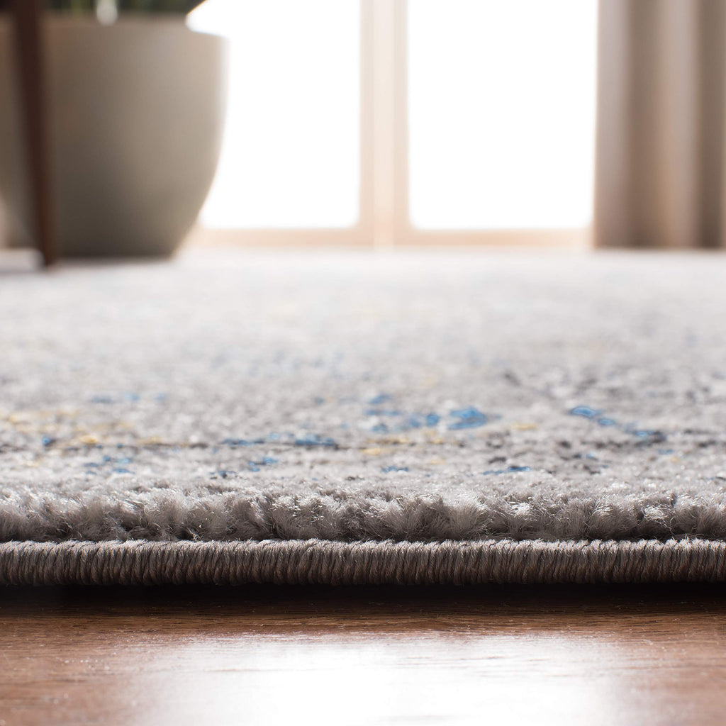 SAFAVIEH Evoke Collection Area Rug - 10' x 14', Dark Grey & Yellow, Boho Oriental Design, Non-Shedding & Easy Care, Ideal for High Traffic Areas in Living Room, Bedroom (EVK224G)