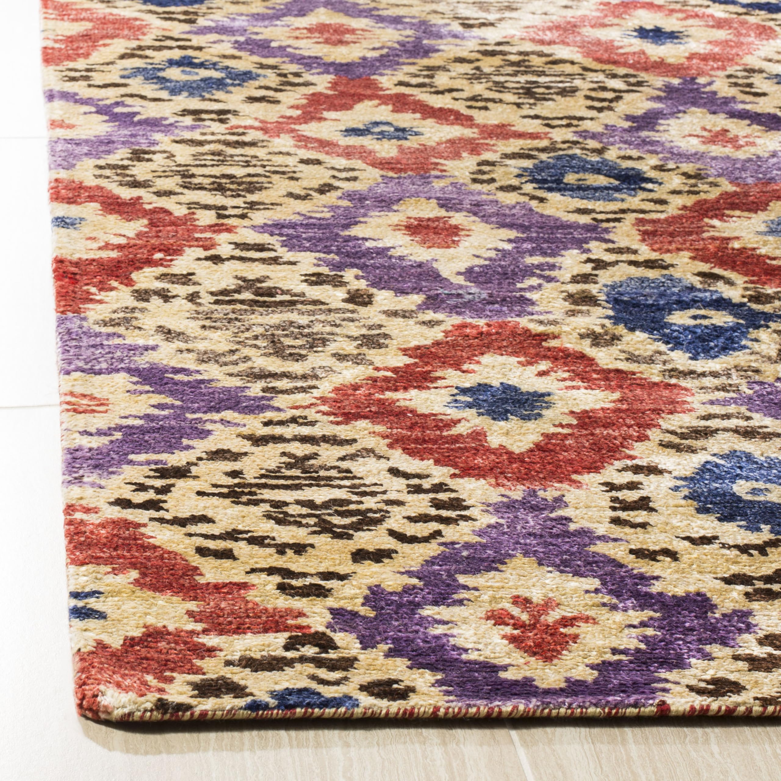 SAFAVIEH Luxor Collection Area Rug - 6' x 9', Purple & Rust, Handmade Ikat Design Banana Silk, Ideal for High Traffic Areas in Living Room, Bedroom (LUX161A)