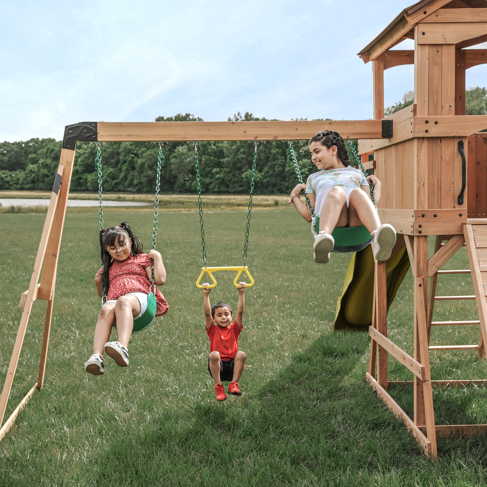 Backyard Discovery Sterling Point Cedar Wood Swing Set with Wave Slide, Raised Clubhouse, Wooden Bridge, Rock Wall, Belt Swings, Web Swing, Trapeze, Balcony, Climbing Wall, Ladder, Outdoor Playset