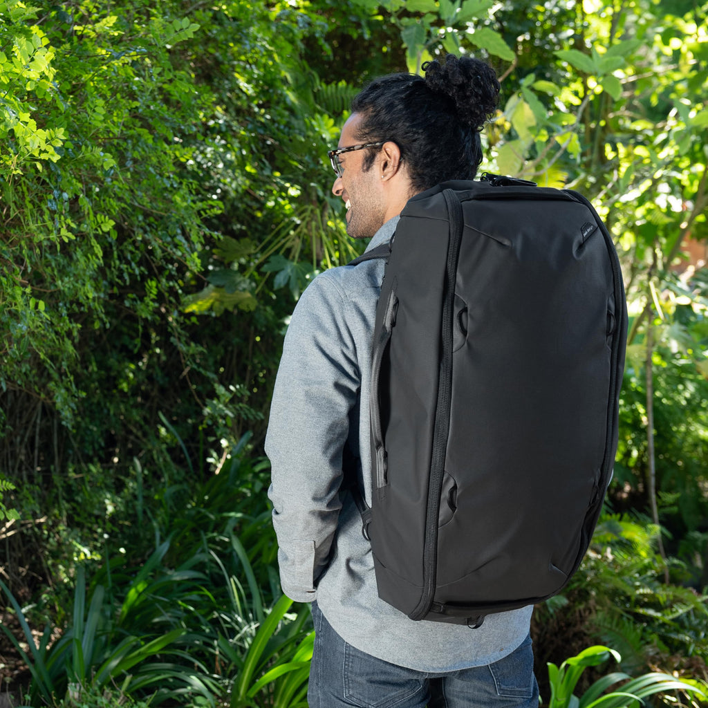 Peak Design Travel Duffelpack 45-65L, Black, Weatherproof Duffel Backpack, Expandable Design, Extra-Long Zip Path, Stowable Straps, Fits Packing Cubes and Camera Cubes, Versatile Duffel Bag for Travel