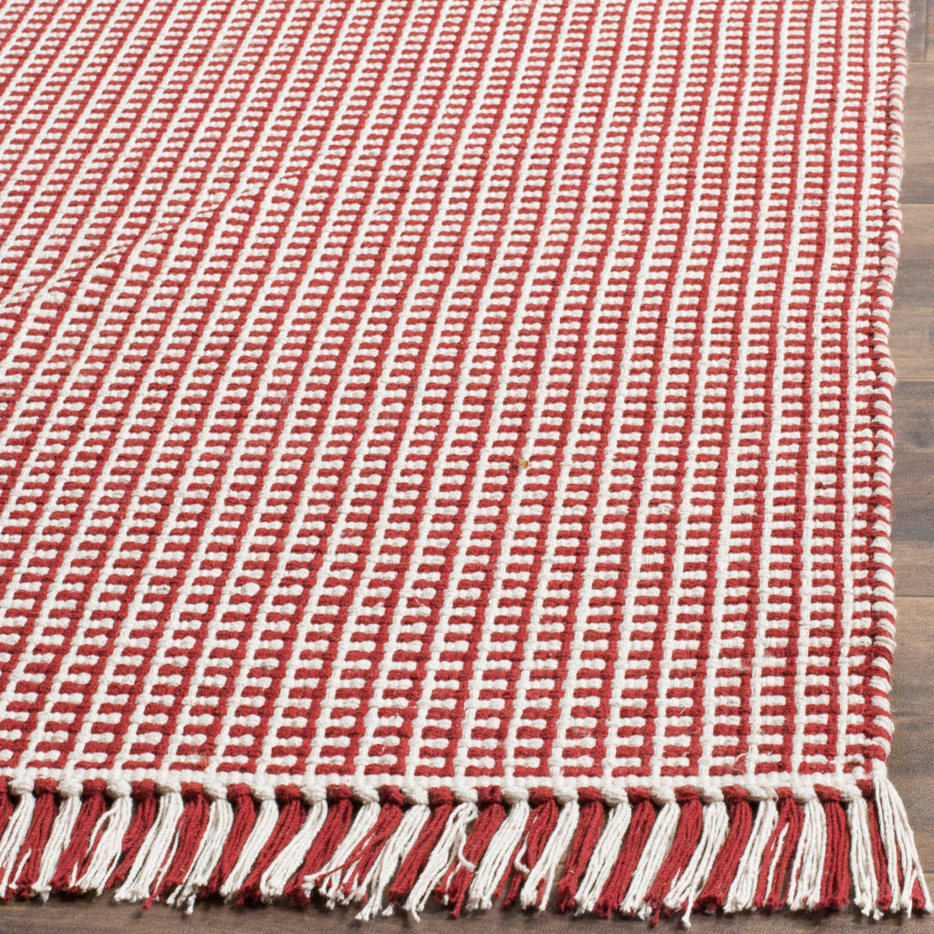 SAFAVIEH Montauk Collection Area Rug - 9' x 12', Ivory & Red, Handmade Flat Weave Boho Farmhouse Cotton Tassel Fringe, Ideal for High Traffic Areas in Living Room, Bedroom (MTK340C)