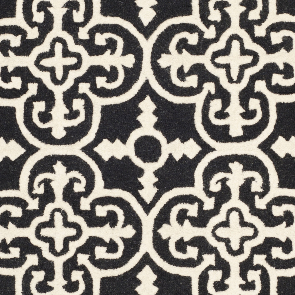 SAFAVIEH Cambridge Collection Area Rug - 9' x 12', Black & Ivory, Handmade Moroccan Wool, Ideal for High Traffic Areas in Living Room, Bedroom (CAM133E)
