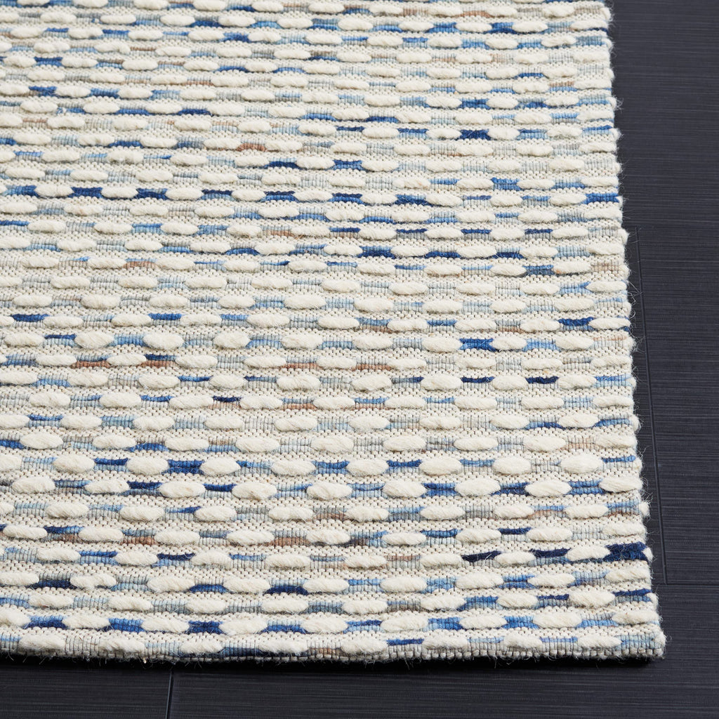 SAFAVIEH Area Rug 8x10 - Marbella Collection - Large - White & Navy, Handmade Wool, Ideal for Living Room, Bedroom, Office, Dining Space (MRB158N)