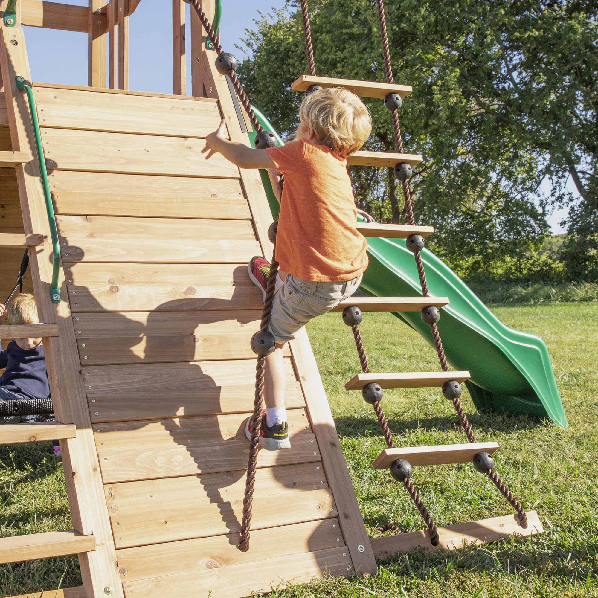 Backyard Discovery Endeavor All Cedar Wood Swing Set Playset for Backyard with Large Clubhouse Wave Slide Rope Ladder Rock Climbing Wall Wave Slide 2 Belt Swings and 1 Web Swing Gift for Ages 3-10