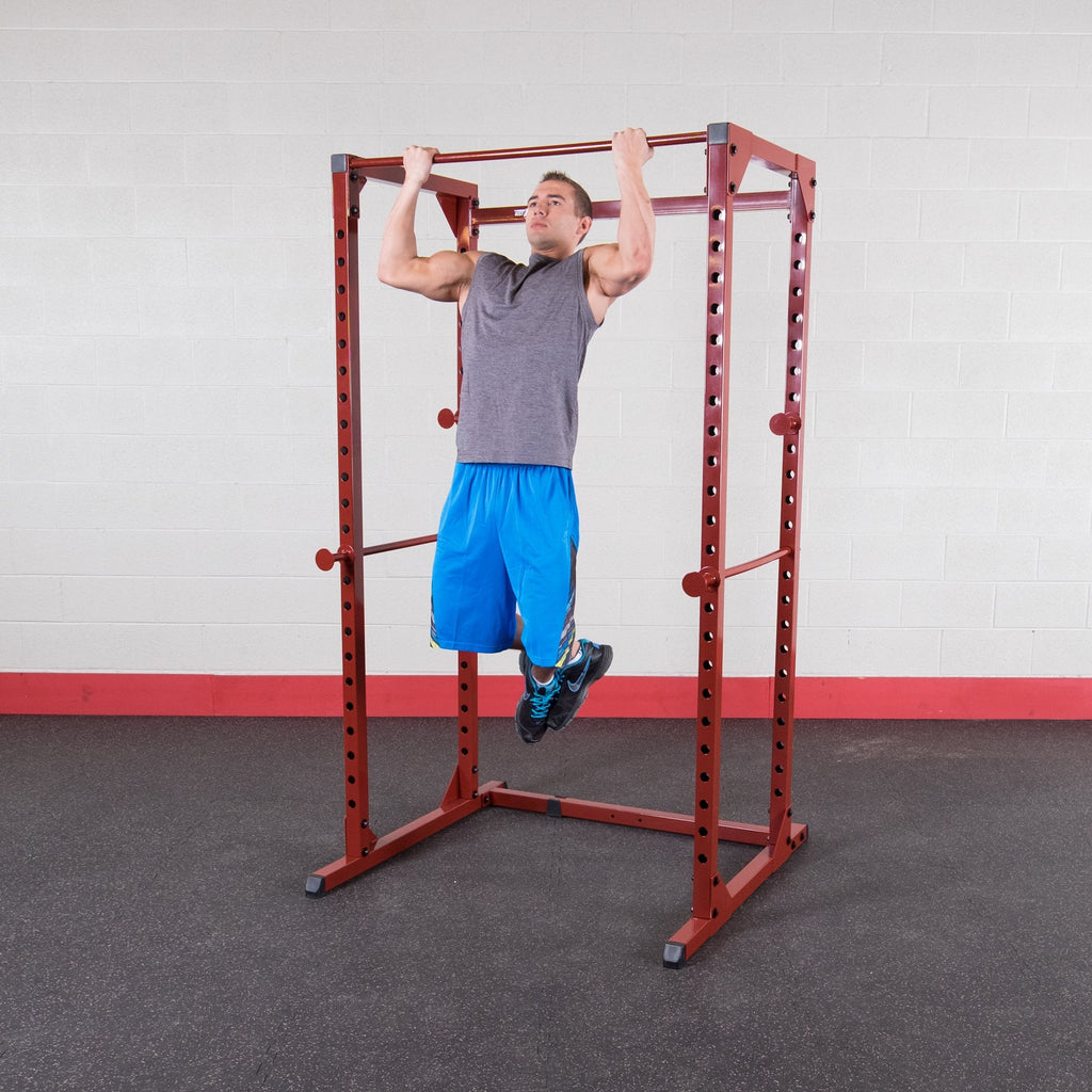 Body-Solid Best Fitness Power Rack - 14-Gauge Steel Home Gym with 500lb Capacity, Chin Bar, 23 Adjustable Safety Bars, Optional LAT & Dip Attachments, Red