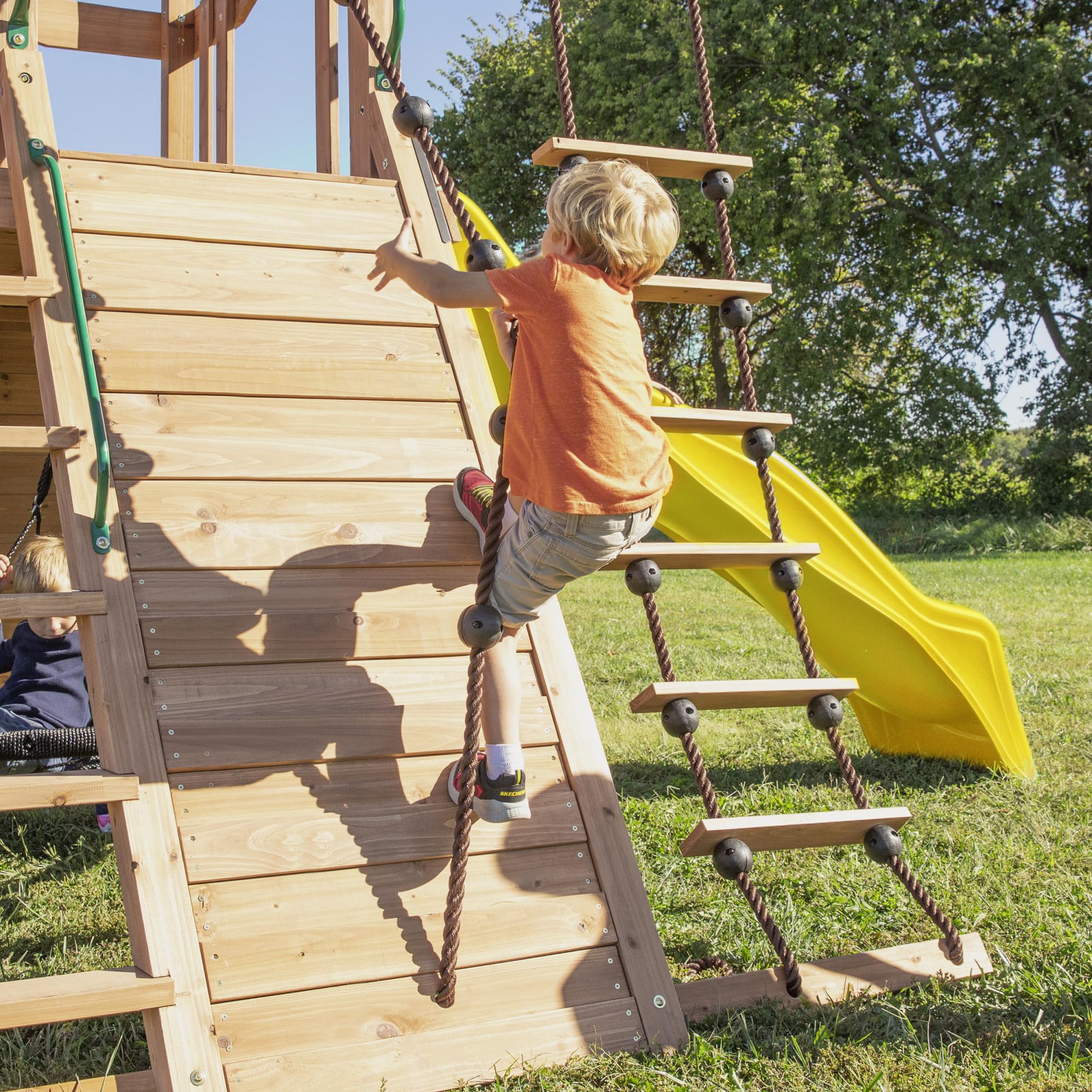 Backyard Discovery Endeavor Cedar Wood Swing Set with Wave Slide, Play Deck, Double Rock Wall, Rope Ladder, Climbing Wall, Belt Swings, 40-Inch Web Swing, Step Ladder, Toy Telescope, Outdoor Playset