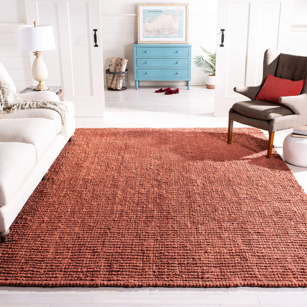 SAFAVIEH Area Rug 8x10 - Natural Fiber Collection - Large - Rust, Handmade Jute, Farmhouse Style, Chunky Textured Thick Pile (NF447C)