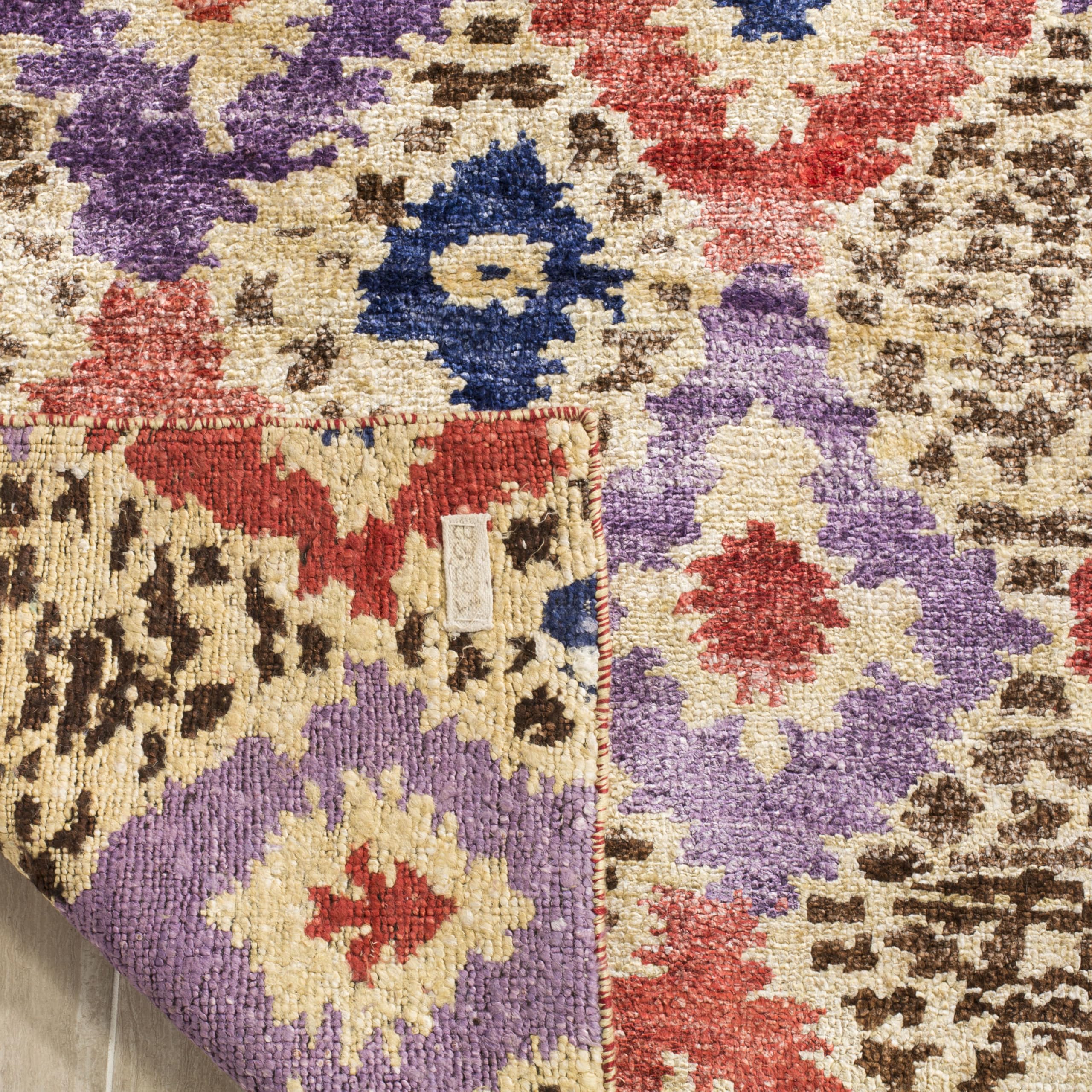 SAFAVIEH Luxor Collection Area Rug - 6' x 9', Purple & Rust, Handmade Ikat Design Banana Silk, Ideal for High Traffic Areas in Living Room, Bedroom (LUX161A)
