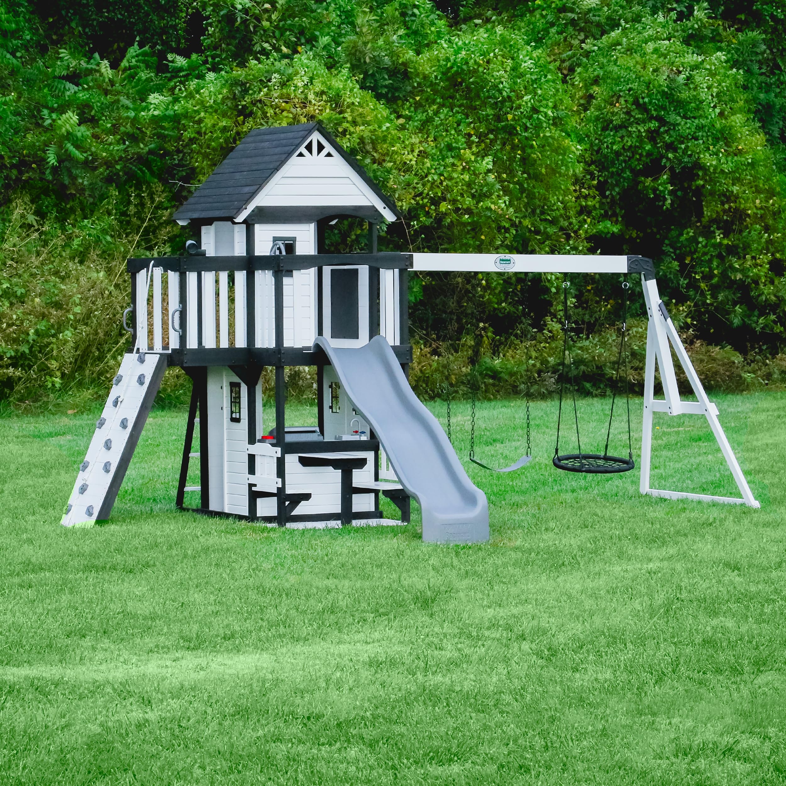 Backyard Discovery Canyon Creek White Cedar Wood Swing Set with Wave Slide, Clubhouse, Play Kitchen, Picnic Area, Belt Swings, Web Swing, Rock Wall, Balconies, Playhouse, Step Ladder, Outdoor Playset