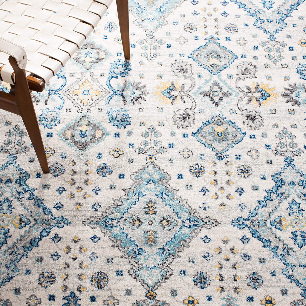 SAFAVIEH Evoke Collection 10' x 14' Ivory / Light Blue EVK224C Boho Oriental Non-Shedding Living Room Bedroom Dining Home Office Area Rug