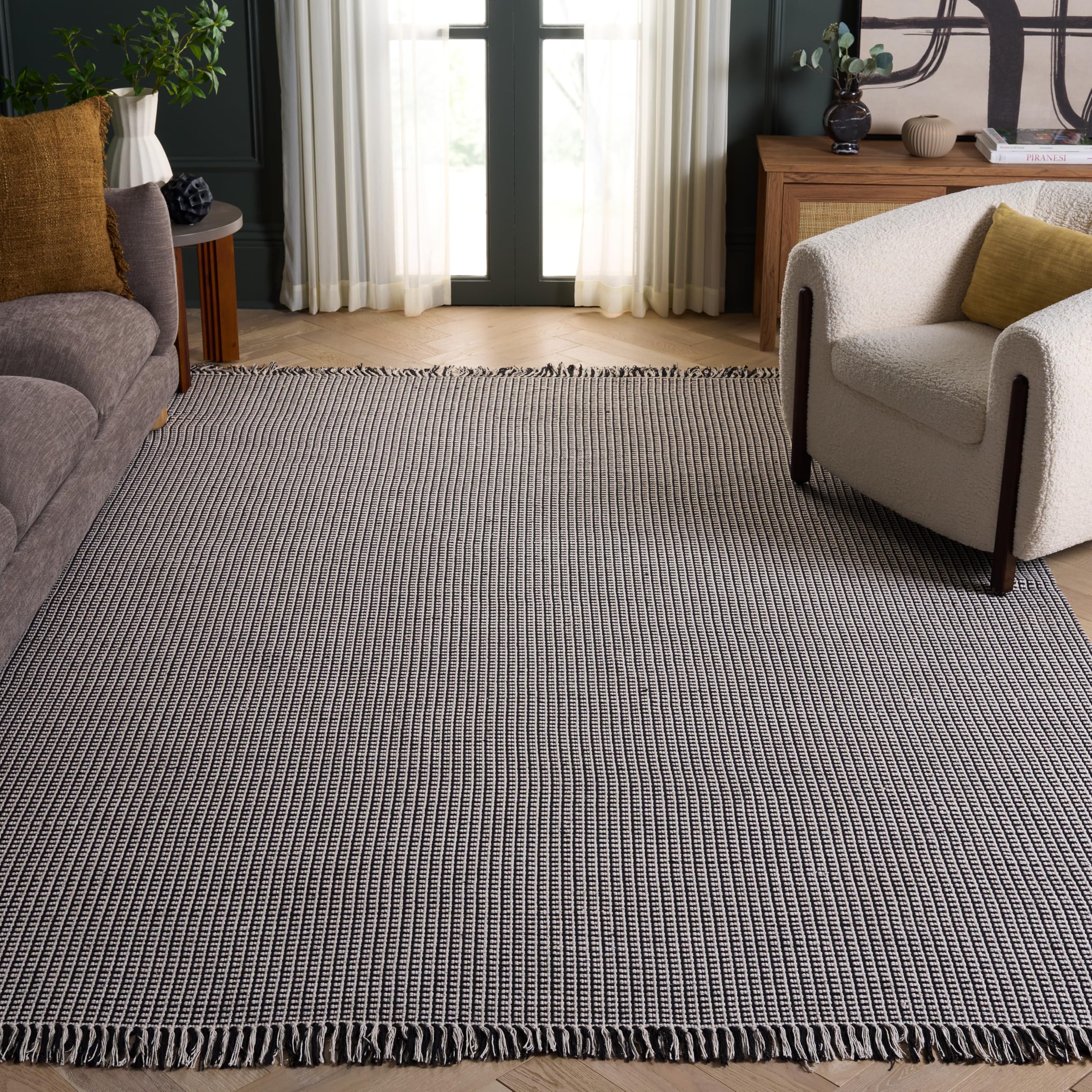 SAFAVIEH Montauk Collection Area Rug - 9' x 12', Ivory & Black, Handmade Flat Weave Boho Farmhouse Cotton Tassel Fringe, Ideal for High Traffic Areas in Living Room, Bedroom (MTK340D)