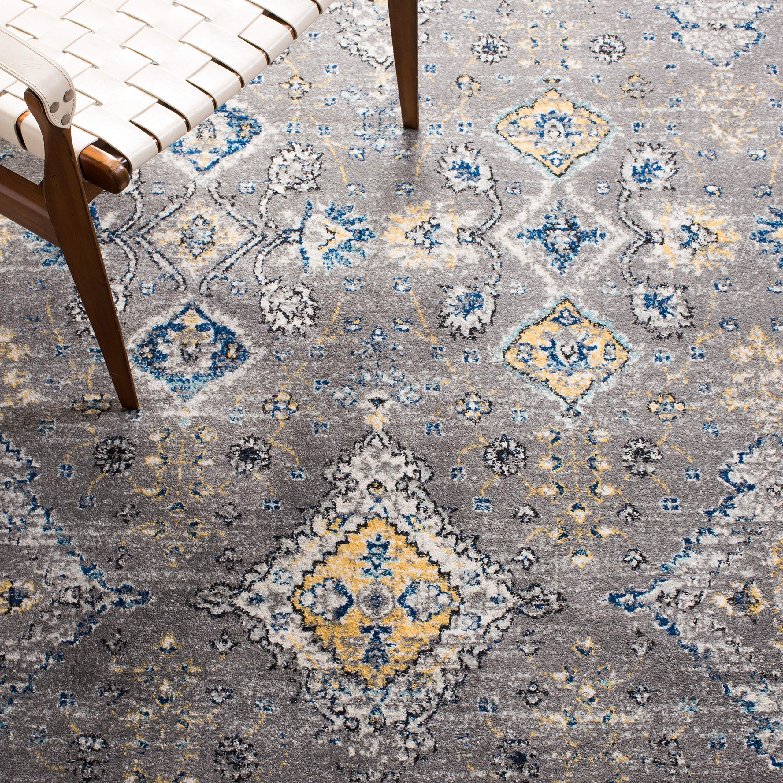 SAFAVIEH Evoke Collection Area Rug - 10' x 14', Dark Grey & Yellow, Boho Oriental Design, Non-Shedding & Easy Care, Ideal for High Traffic Areas in Living Room, Bedroom (EVK224G)