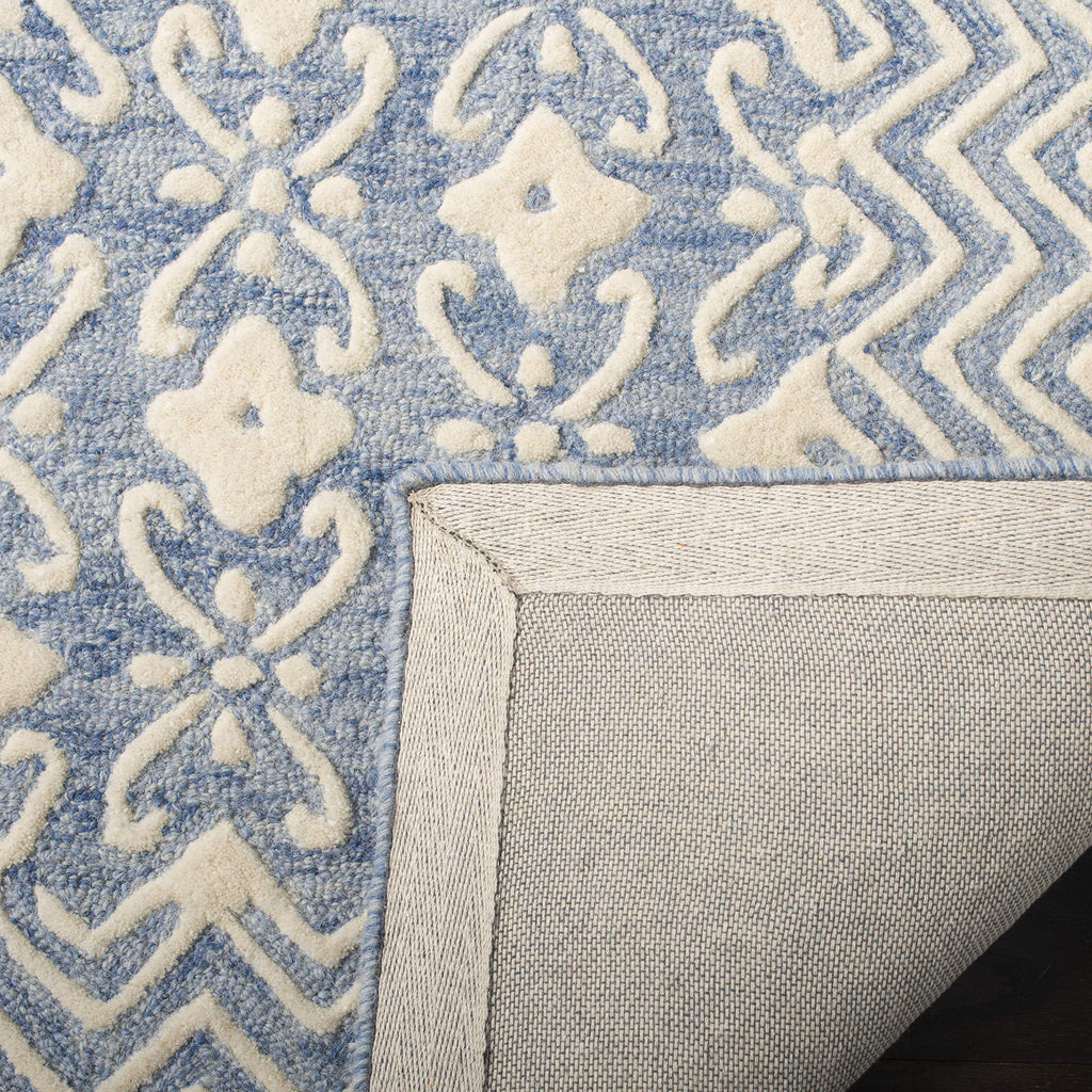 SAFAVIEH Blossom Collection Area Rug - 6' x 9', Blue & Ivory, Handmade Wool, Ideal for High Traffic Areas in Living Room, Bedroom (BLM114M)